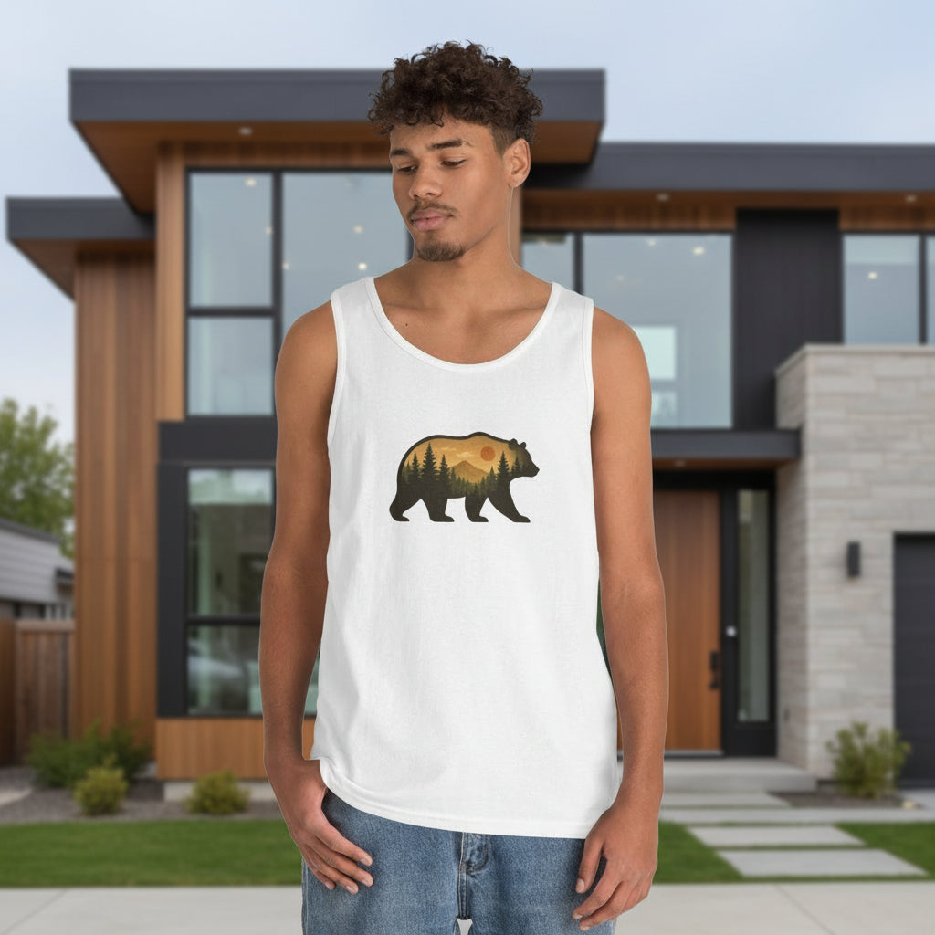 Man wearing a white tank top with a bear graphic in front of a modern house.